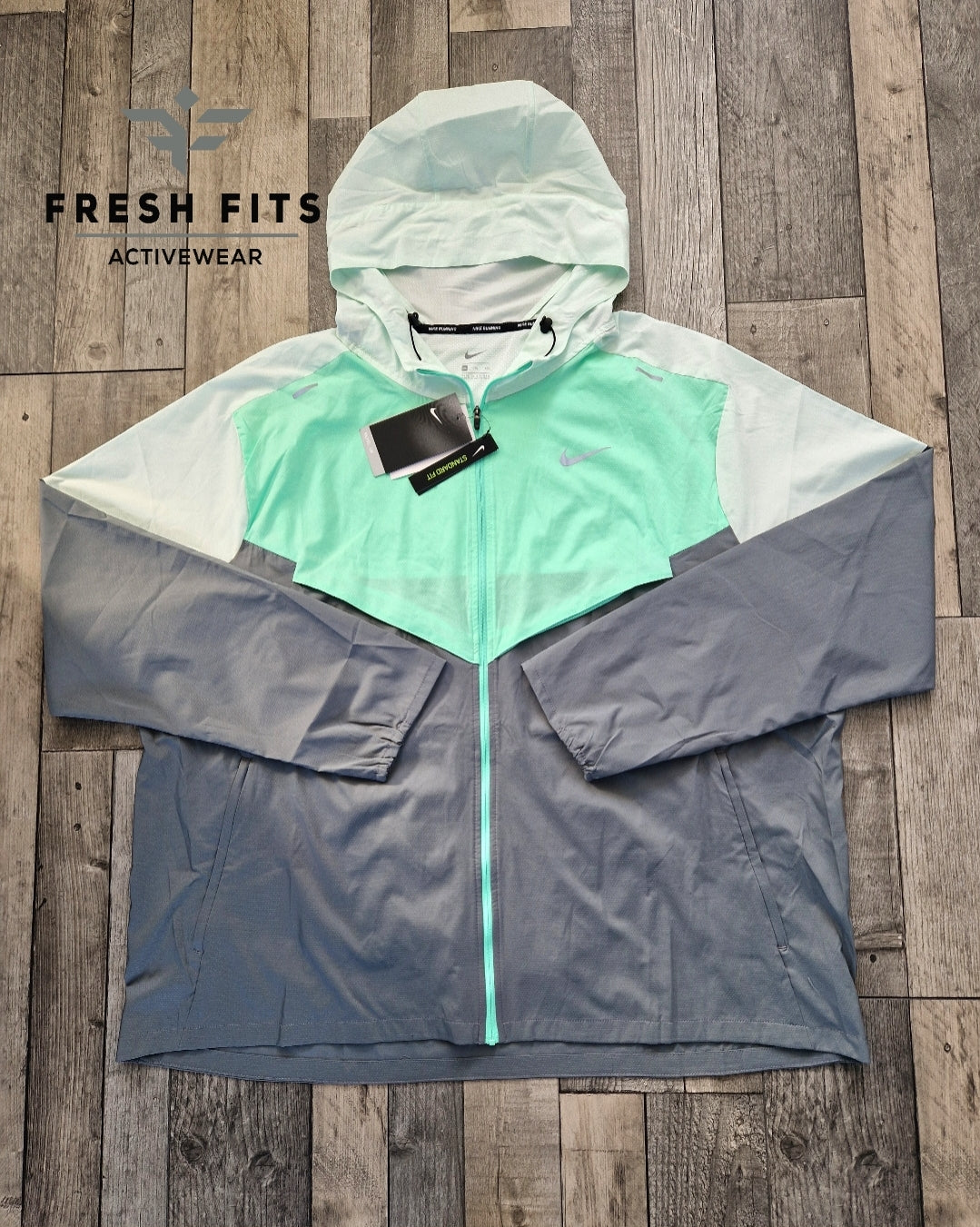 NIKE REPEL UV MINT WINDRUNNER