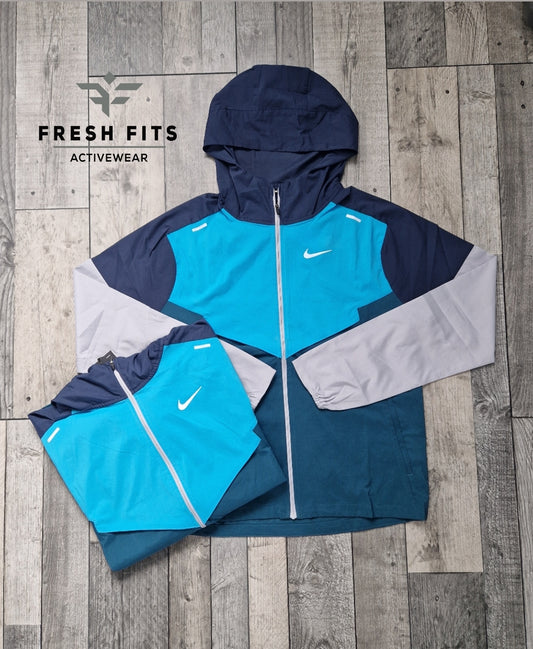 NIKE UV WINDRUNNER PETROL BLUE