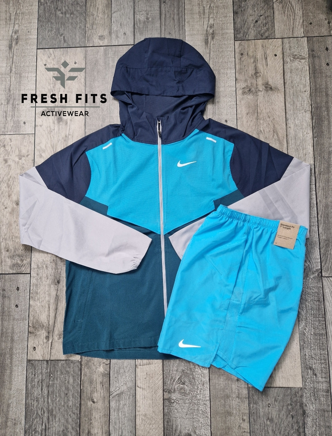 NIKE UV WINDRUNNER PETROL BLUE