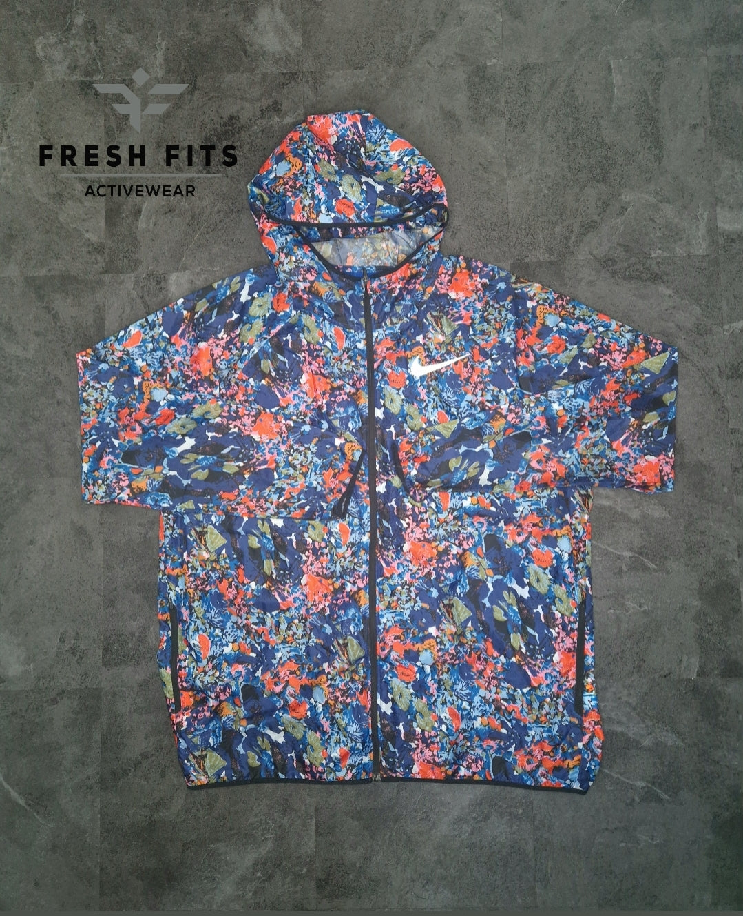 RARE NIKE CORAL BLUE FLORAL WINDRUNNER