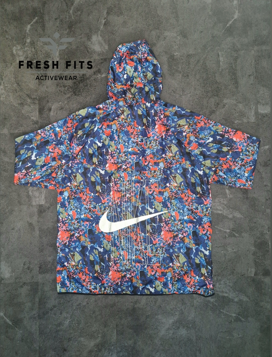 RARE NIKE CORAL BLUE FLORAL WINDRUNNER