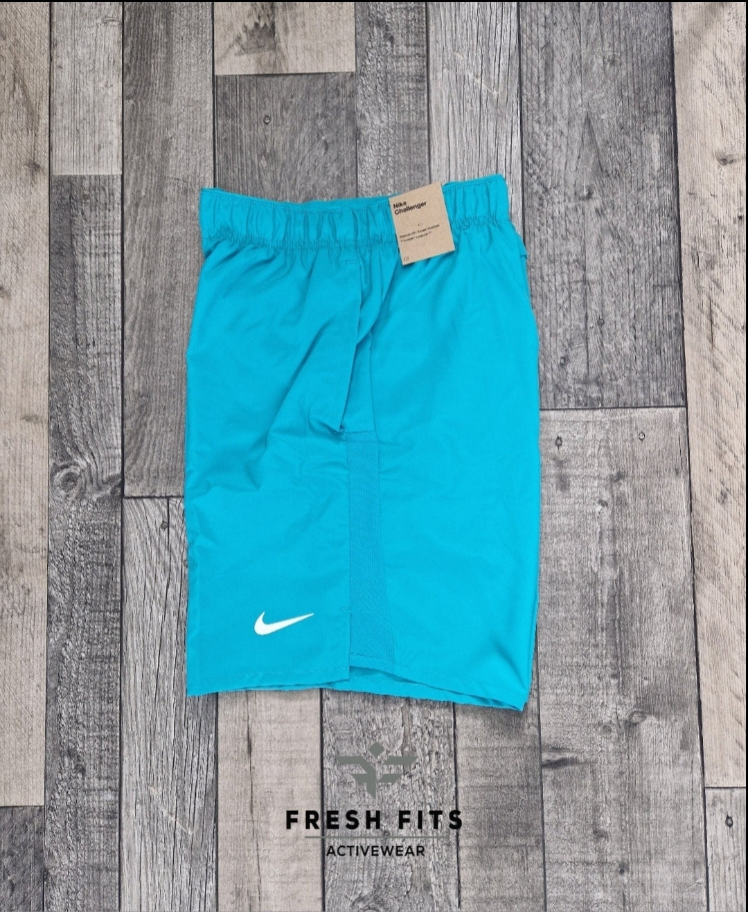 NIKE CHALLENGER SHORTS 7" (AQUA)