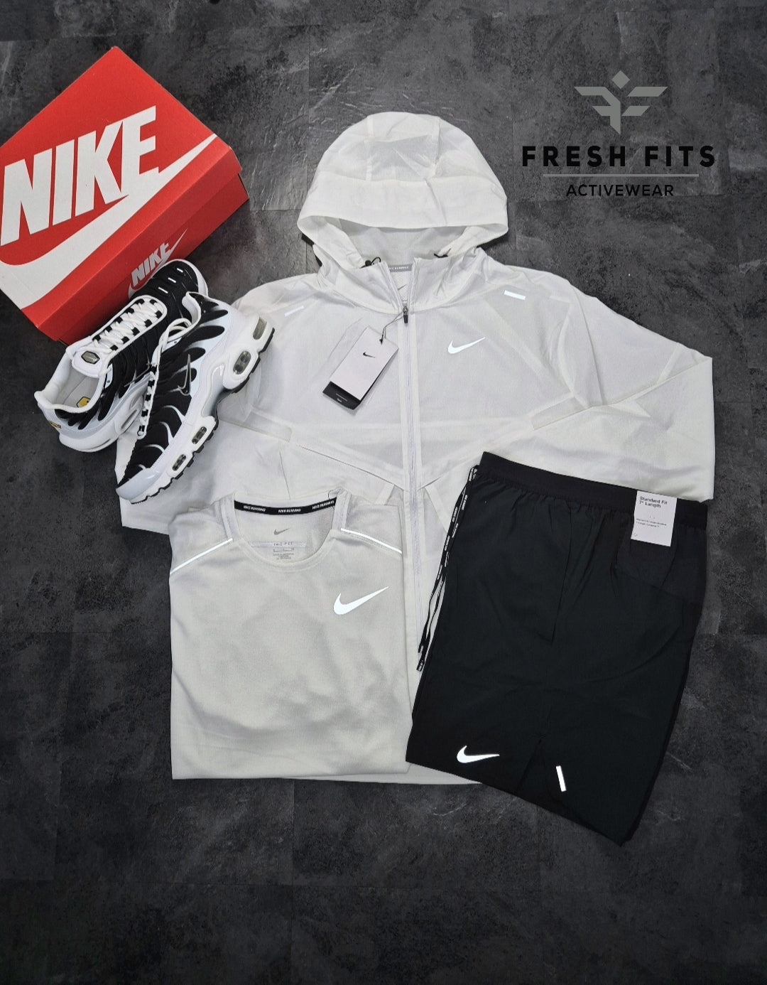 Nike Ice White Uv Windrunner, Miler 1.0 & Flex Stride 7" Shorts Black.