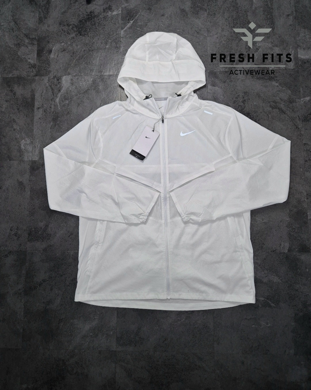 Nike Ice White Uv Windrunner, Miler 1.0 & Flex Stride 7" Shorts Black.